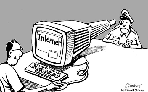 Internet sous surveillance. Dessin de Patrick Chappatte.
